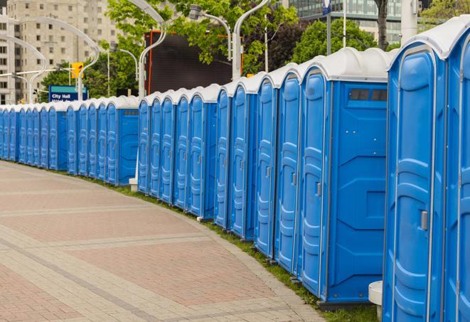 a row of portable restrooms at a fairground, offering visitors a clean and hassle-free experience in plains